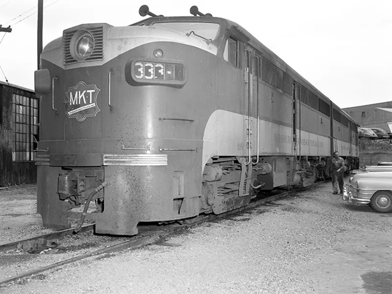 Front of a train parked in a terminal.