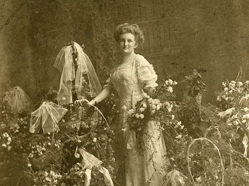 Anne King Sullivan with Flower Arrangements